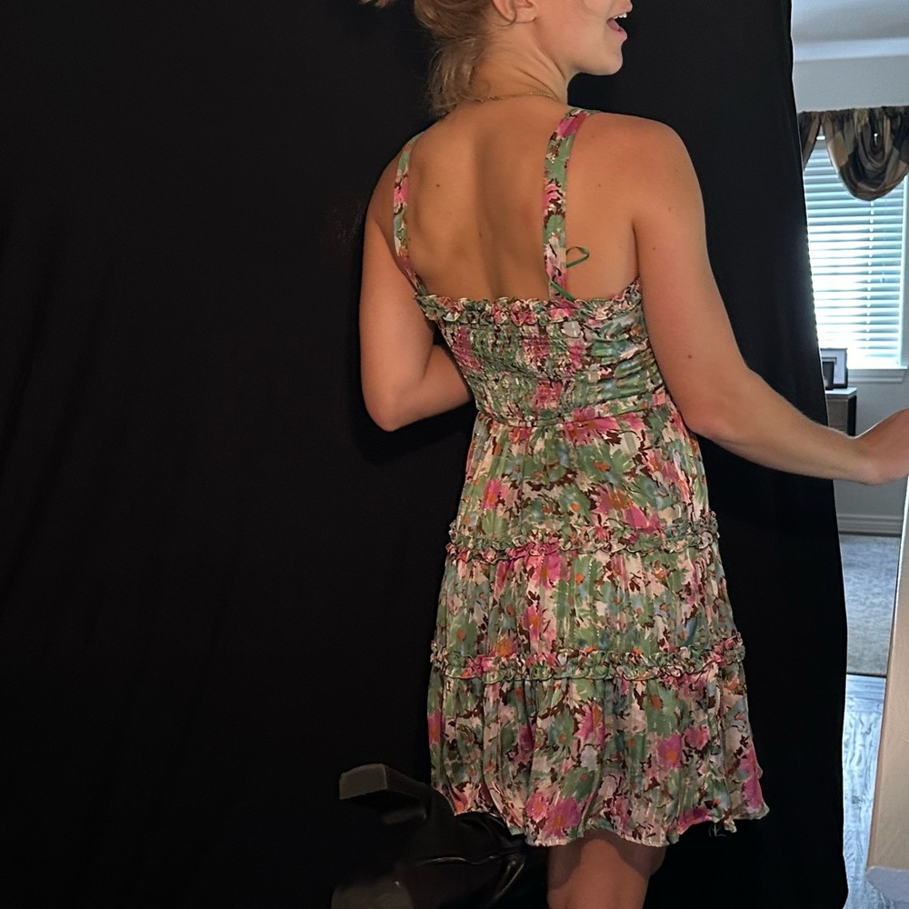Beautiful mini dress with flowers and stench